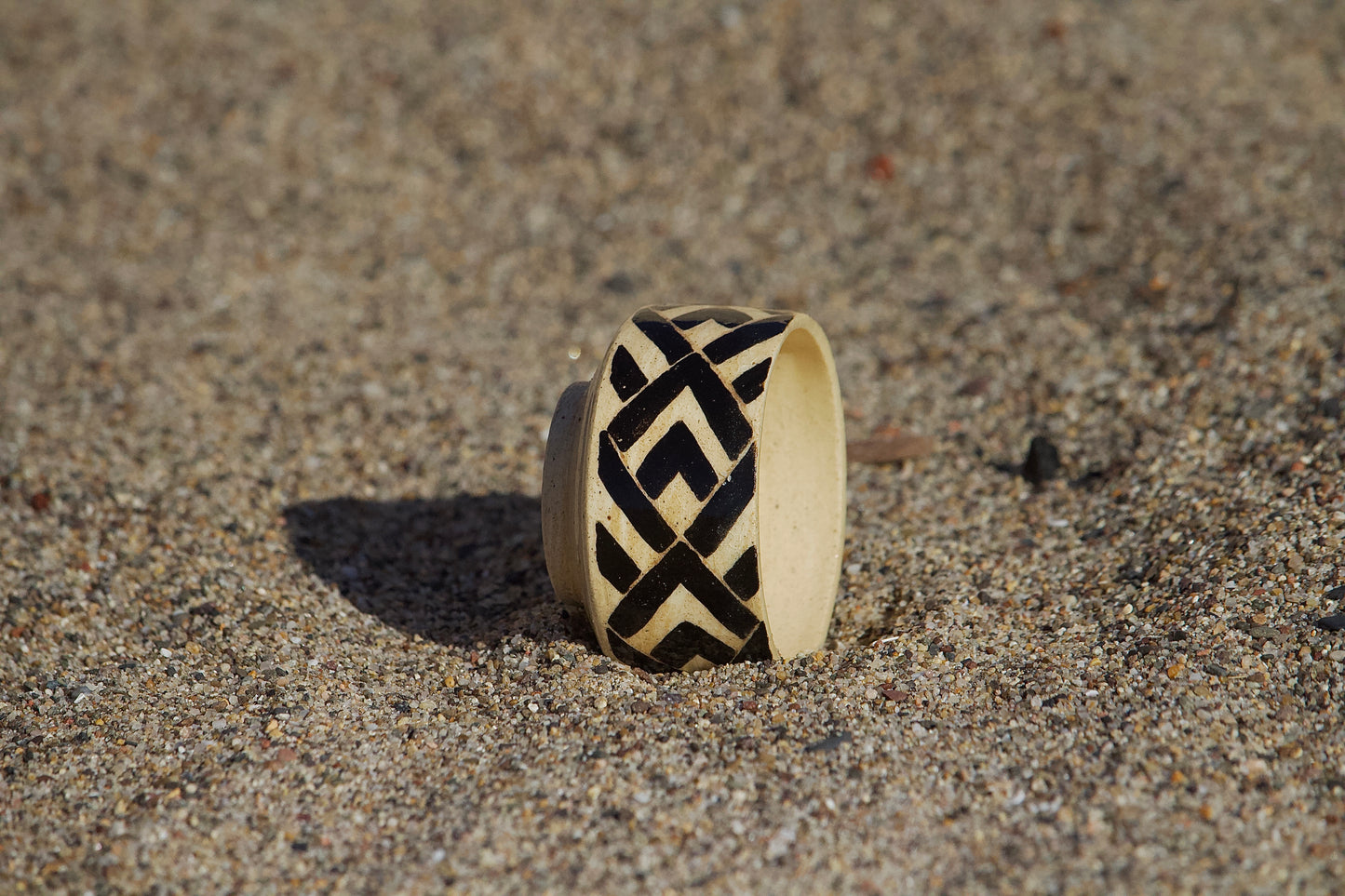 Ngikel (spear) border cup